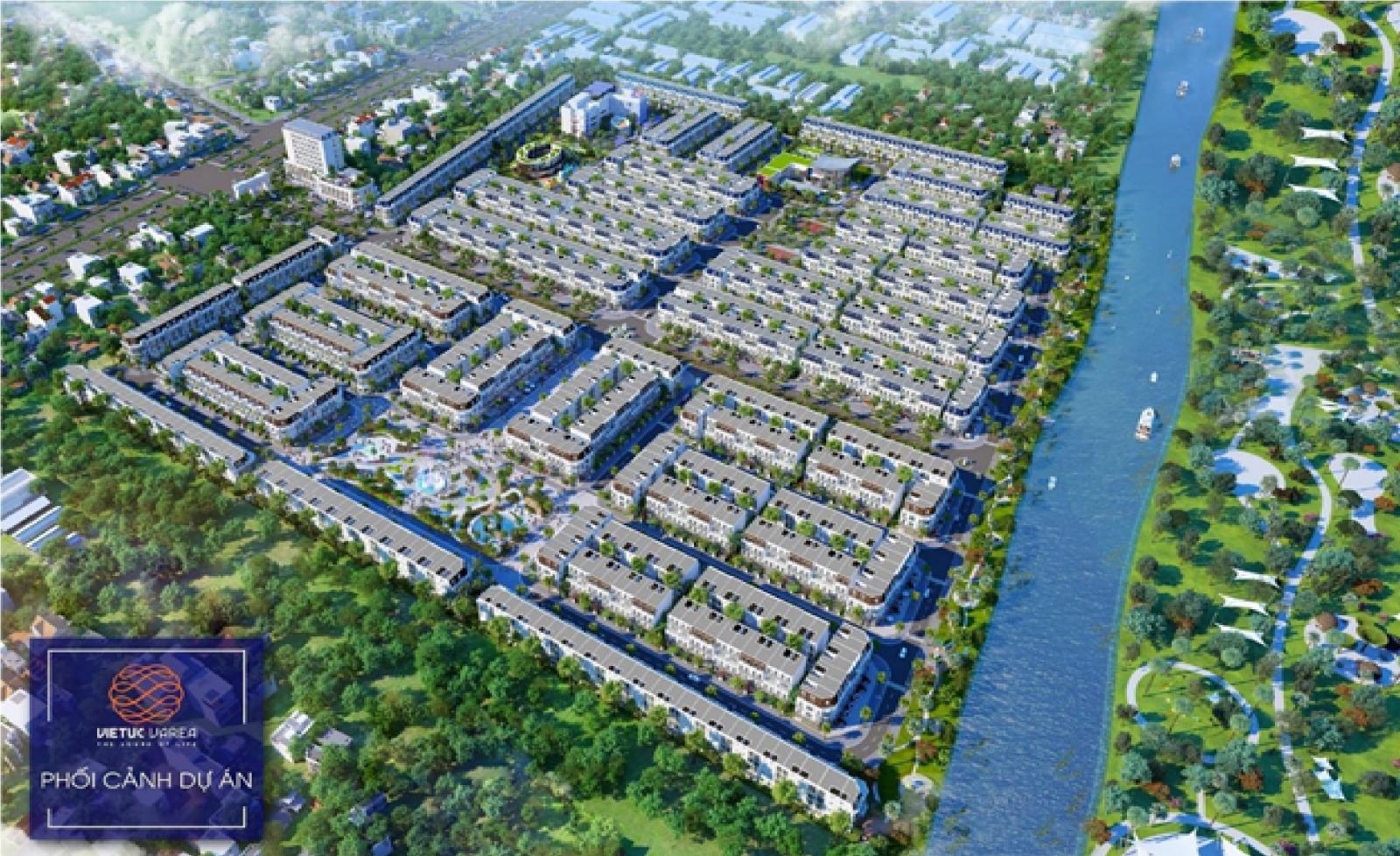 Phối cảnh tổng thể dự án nằm sát dòng sông, xung quanh có nhiều cây xanh