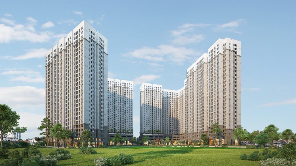 Ảnh chụp một dự án chung cư gồm nhiều khối nhà cao tầng xếp thành hình chữ U, bên dưới là khuông viên xanh.